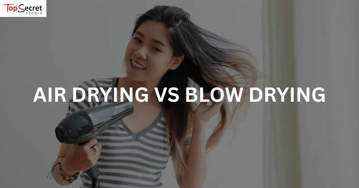 Asian woman blow drying her hair